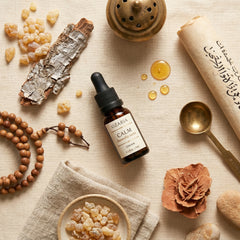 CALM Royal Hojari frankincense oil composition flat-lay — Omani craftsmanship