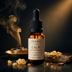 CALM dramatic chiaroscuro — bottle with frankincense resin and smoke